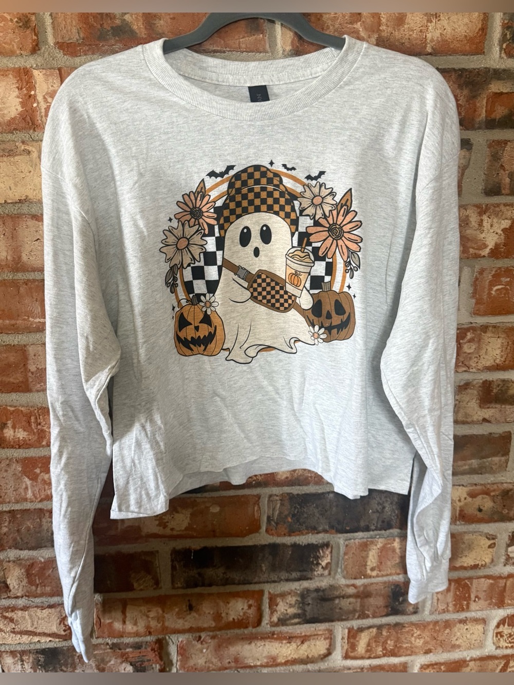 Gildan Light Gray Long Sleeve Cropped Ghost Graphic Tee with Orange Accents